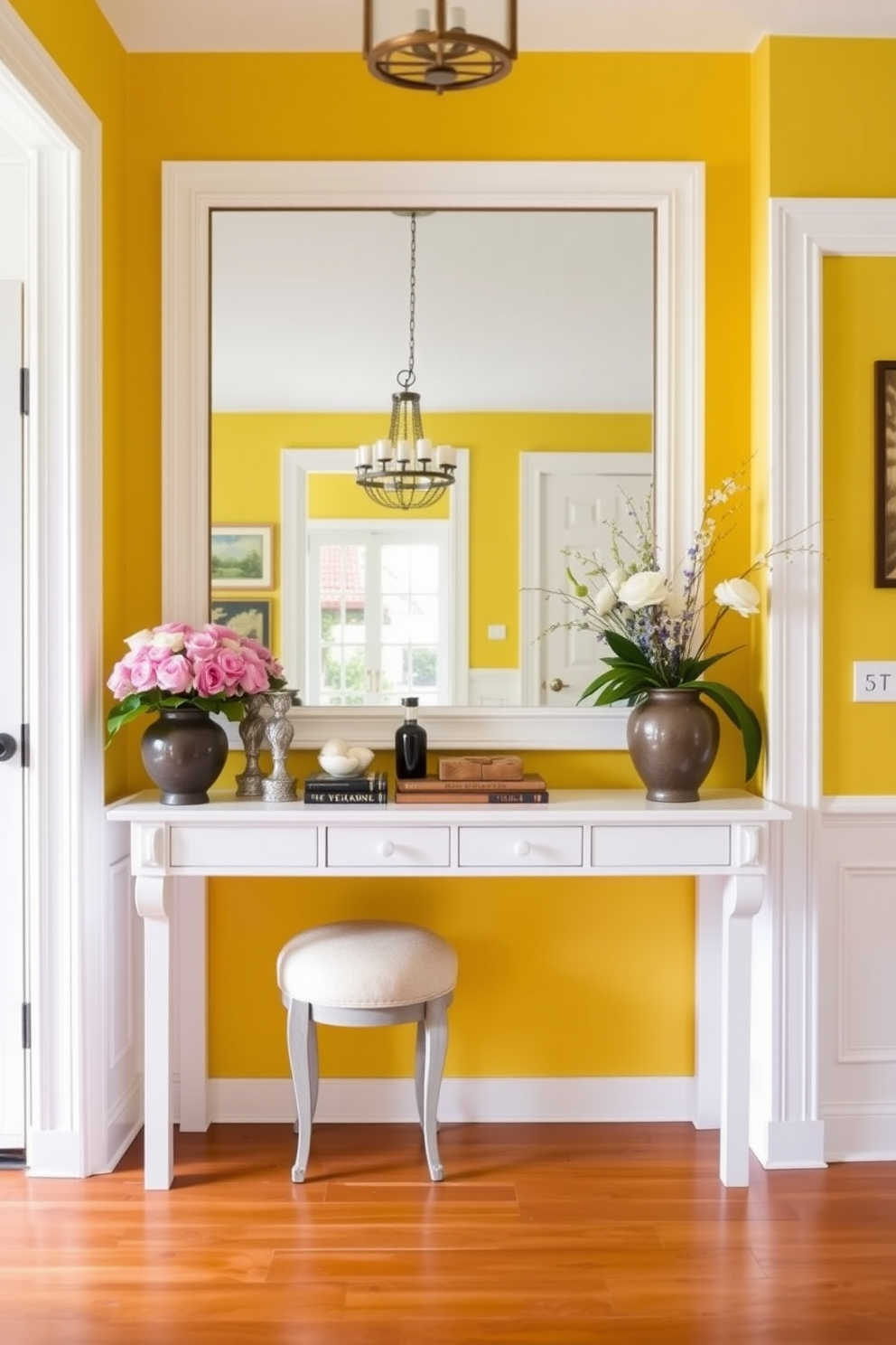 A bright and inviting foyer features a sunny yellow accent wall adorned with various art pieces that add character and warmth to the space. The flooring is a light wood that complements the vibrant wall, while a stylish console table sits against the wall, showcasing decorative items and a mirror above it.