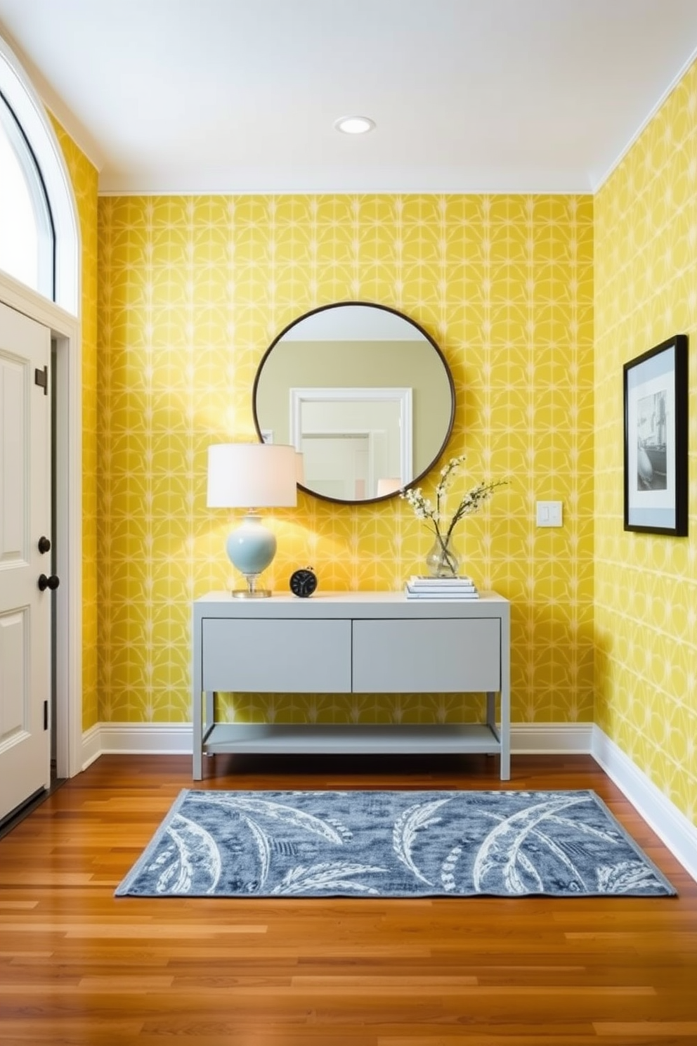 A bright and airy foyer showcases yellow geometric wallpaper that adds a modern touch to the space. The flooring is a sleek hardwood that complements the vibrant walls, while a minimalist console table sits against the wall adorned with a statement lamp. Incorporating a large round mirror above the console table creates an illusion of depth and light. A stylish area rug with subtle patterns defines the entryway, making the space inviting and functional.