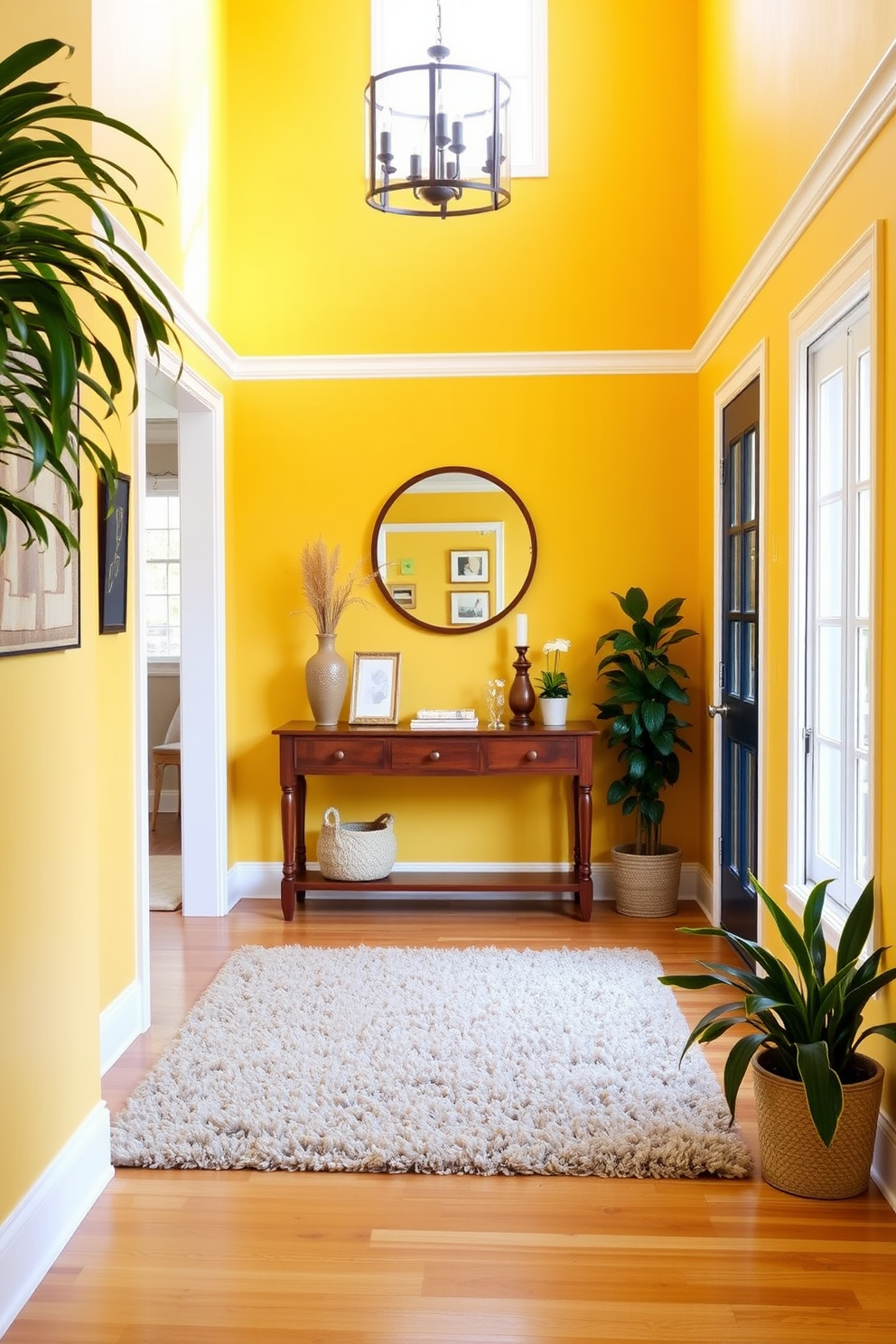 A bright and inviting foyer with yellow walls that radiate warmth. The space features a wooden console table adorned with decorative items and a round mirror above it, reflecting natural light. A plush area rug in neutral tones lies underfoot, adding texture to the entryway. Potted plants in the corners enhance the welcoming atmosphere, creating a seamless blend of yellow and wood elements.