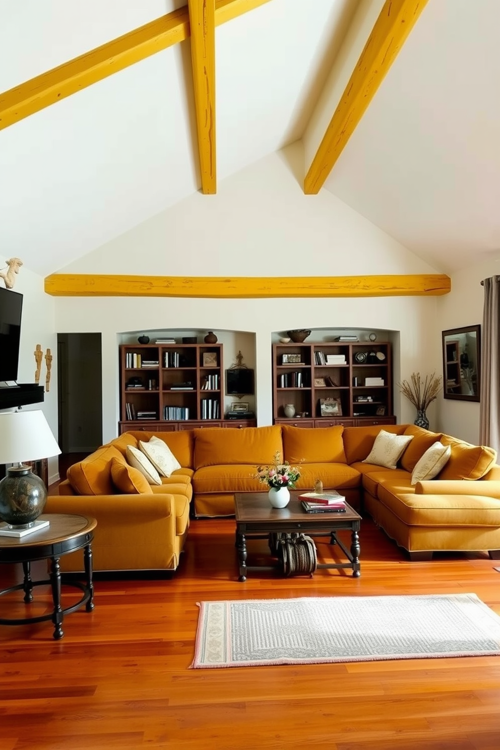 A cozy living room with rustic yellow beams in a vaulted ceiling creates a warm atmosphere. The walls are painted in a soft cream color, and the floor is adorned with a rich hardwood finish. A large, inviting sectional sofa in a deep mustard hue sits in the center of the room. Accents of natural wood and woven textures are incorporated through coffee tables and decorative pillows.