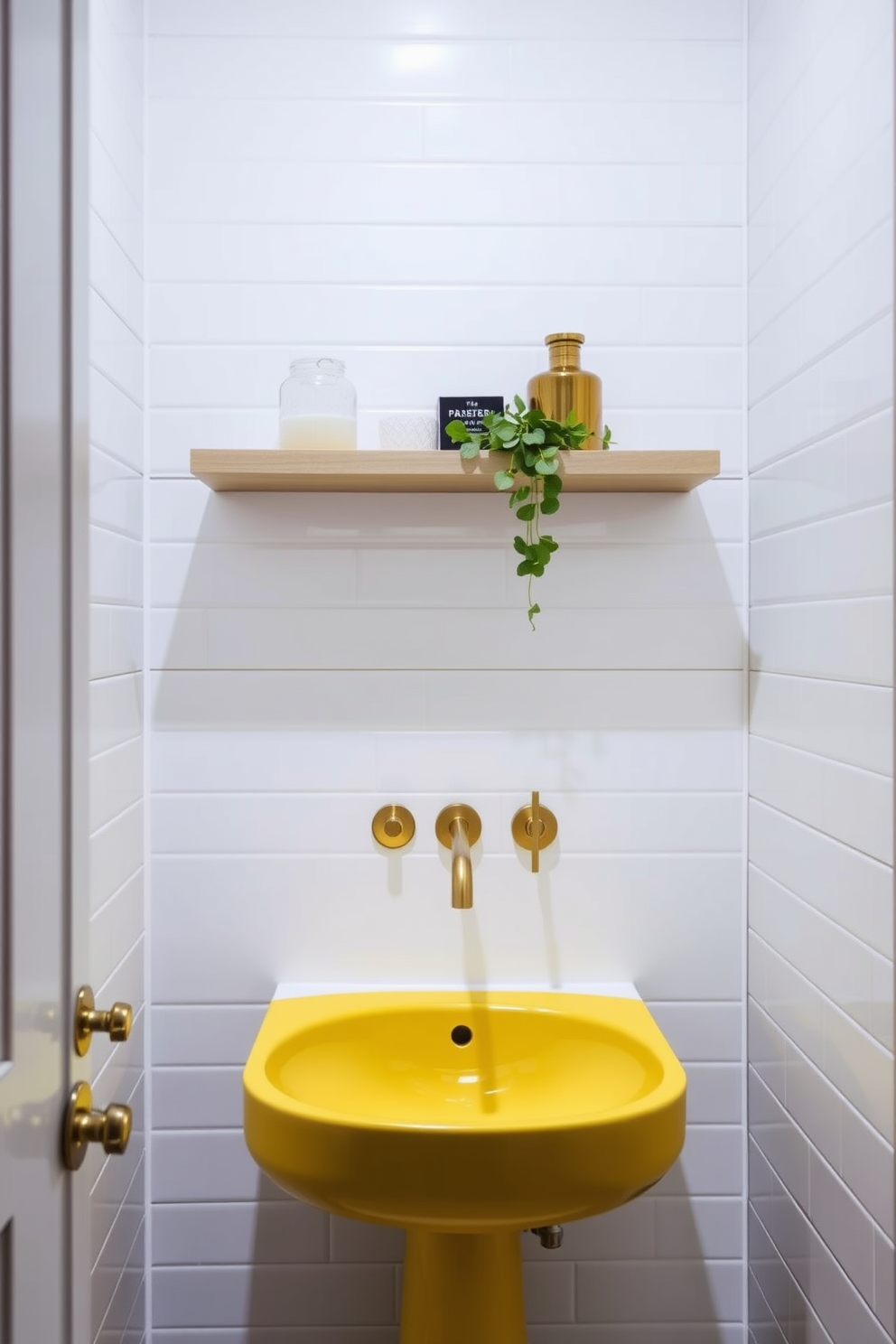 A chic yellow sink with a modern design serves as the focal point of a stylish powder room. The walls are adorned with sleek white tiles, creating a bright and airy atmosphere that complements the vibrant sink. Contemporary fixtures in brushed gold add a touch of elegance and sophistication. A minimalistic floating shelf above the sink displays decorative items and fresh greenery, enhancing the room's charm.